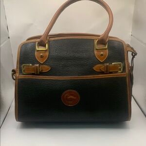 Dooney & Bourke Black and Brown Pebbled Leather bag with Timeless Design